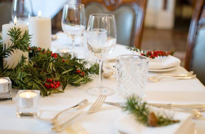 A beautifully set festive dining table at Berwick Lodge, adorned with elegant decorations, fine china, and soft candlelight — ready for a luxurious Christmas celebration in Bristol