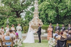 Beautiful outdoor wedding Bristol by the fountain at Berwick Lodge